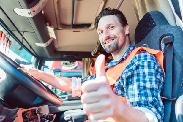 trucking man with thumbs up